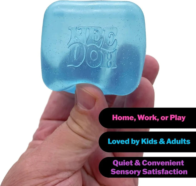 Adult using squishy cube at office desk